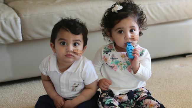 Isaac and Charlize Gravina, then aged 15-months, pictured at home last year.