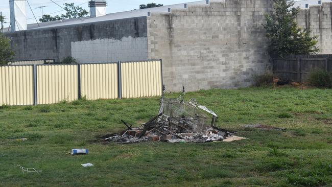 The remnants of a bonfire that witnesses said was burning earlier in the evening, it is not clear if the bonfire is related to the investigation.