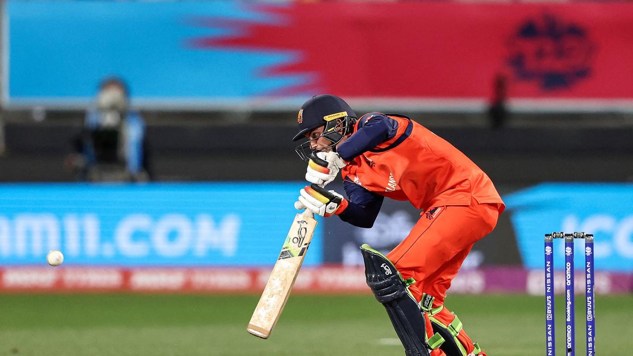 Scott Edwards hitting the winning runs against the UAE. Picture: AFP