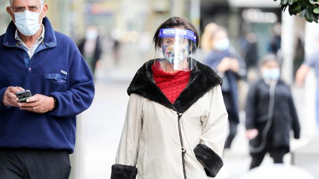 A woman wears a face shield in Bondi Junction in eastern Sydney on Wednesday. Picture: Ryan Osland