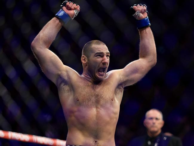 SYDNEY, AUSTRALIA - SEPTEMBER 10:  Sean Strickland of United States reacts as he claims victory over Israel Adesanya of Nigeria  to become the new middleweight champion of the world during the UFC 293 event  at Qudos Bank Arena on September 10, 2023 in Sydney, Australia. (Photo by Mark Evans/Getty Images)