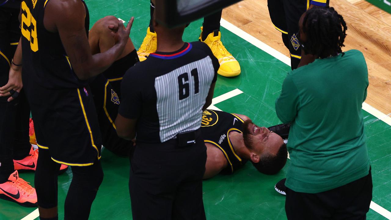 BOSTON, MASSACHUSETTS - JUNE 08: Stephen Curry #30 of the Golden State Warriors reacts after competing for the ball in the fourth quarter against the Boston Celtics during Game Three of the 2022 NBA Finals at TD Garden on June 08, 2022 in Boston, Massachusetts. NOTE TO USER: User expressly acknowledges and agrees that, by downloading and/or using this photograph, User is consenting to the terms and conditions of the Getty Images License Agreement. (Photo by Elsa/Getty Images)