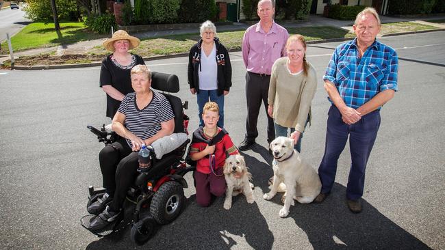 Poowong residents, Judith Martin, Anna Cecil, Harry, 10, Laurie Gregg, John Mandemaker, Fiona Cox and Phil Garrett outside the Poowong Hotel. Picture: Mark Stewart