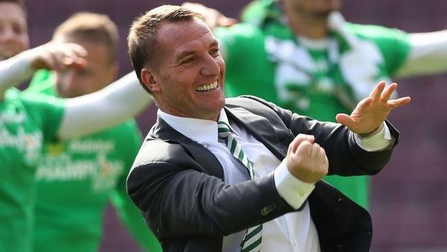 Brendan Rodgers celebrates winning the Scottish title.