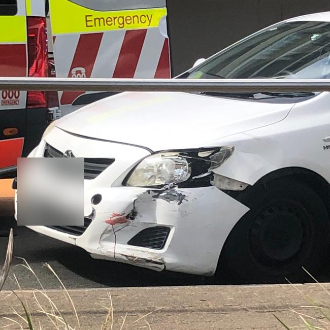 The Toyota sedan suffered significant damage to its front end in the collision. Picture: Jim O’Rourke