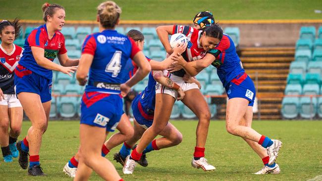 Skyla Adams goes forward for the Roosters. Picture: Thomas Lisson.