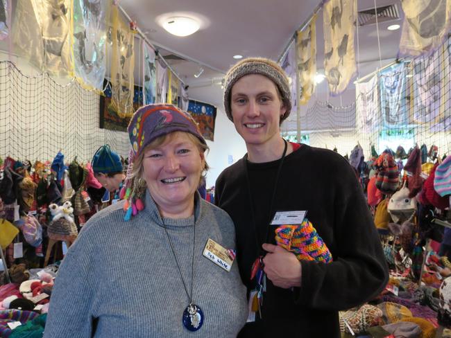 Deborah White and Tom Nixon. Dozens of volunteers are busy hanging thousands of beanies in preparation for the 28th Alice Springs Beanie Festival, running from Friday, June 21, to Monday, June 24, 2024. Picture: Gera Kazakov