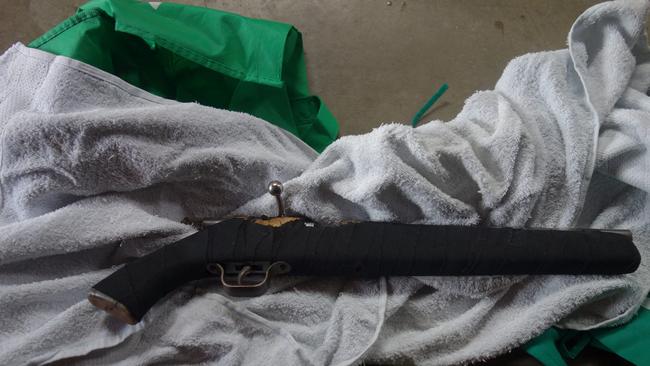 A sawn-off shotgun seized.