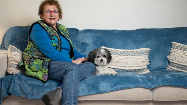 Jenny Barrett at home with her rescue dog, Logan. Picture: Naomi Jellicoe