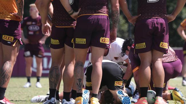 Players gather around Brodie Croft. Picture: Annette Dew