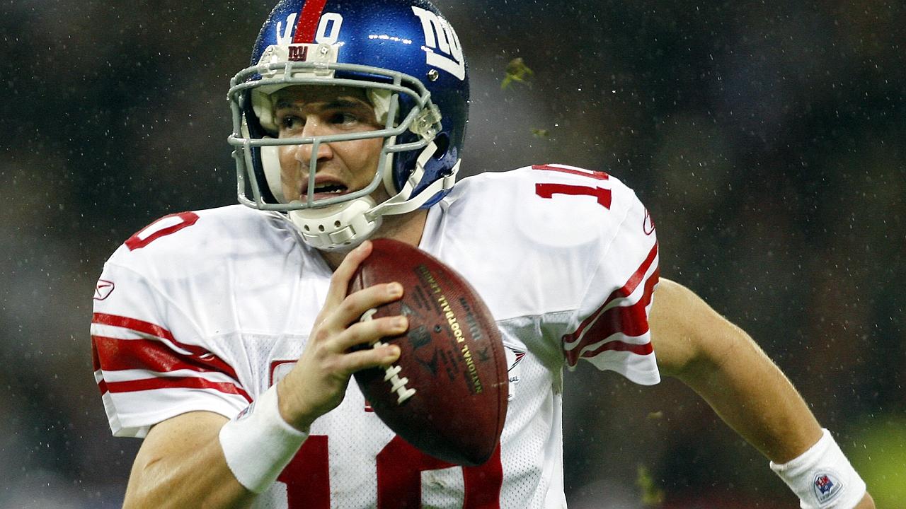 Footballer Eli Manning. Gridiron football - New York Giants vs Miami Dolphins NFL match at Wembley Stadium in London, Englan...