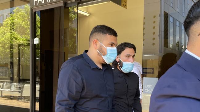 Fadi Zraika (middle) leaves Parramatta Local Court with the five other men, including Zachariya Al-Ahmad (back).