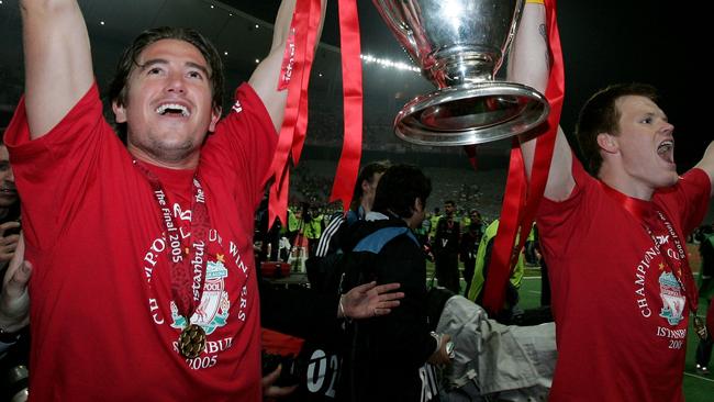 ISTANBUL, TURKEY - MAY 25: Liverpool defender John Arne Riise of Norway (R) and winger Harry Kewell of Australia lifts the European Cup after Liverpool won the European Champions League against AC Milan on May 25, 2005 at the Ataturk Olympic Stadium in Istanbul, Turkey. (Photo by Clive Brunskill/Getty Images)