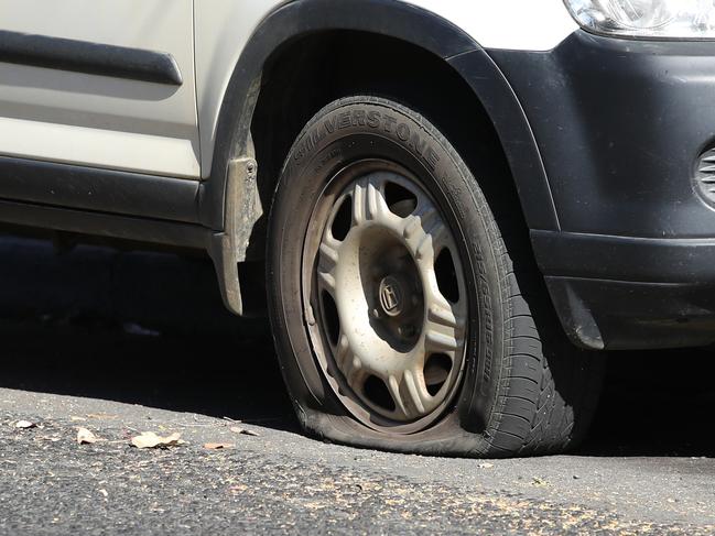 Tasmanian Police investigate numerous cars that had their tyres slashed on Pine Street, West Hobart overnight.   Pine Street. Picture: Zak Simmonds