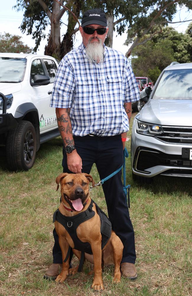 MELBOURNE, AUSTRALIA – DECEMBER 8 2024 Brett and service dog Raven attend the Werribee Cup in Werribee on December 8th, 2024. Picture: Brendan Beckett