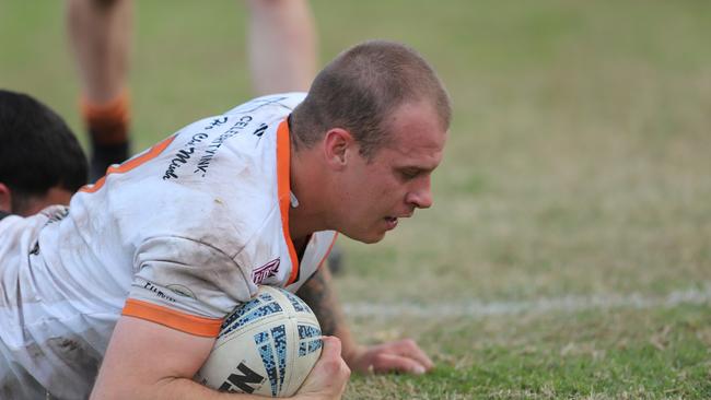 Daniel Smith scores a try for The Oaks Tigers. Picture: Steve Montgomery