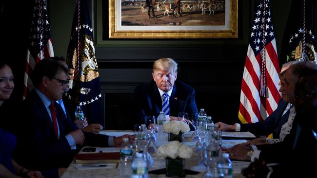 Donald Trump meets administration and state officials on prison reform at the Trump National Golf Club in Bedminster, New Jersey, yesterday. Picture: AFP