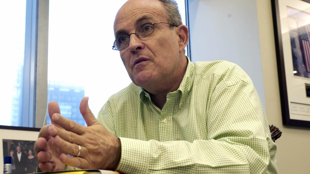 Giuliani in his Times Square office at Giuliani Partners in 2003. Picture: Elizabeth Lippman