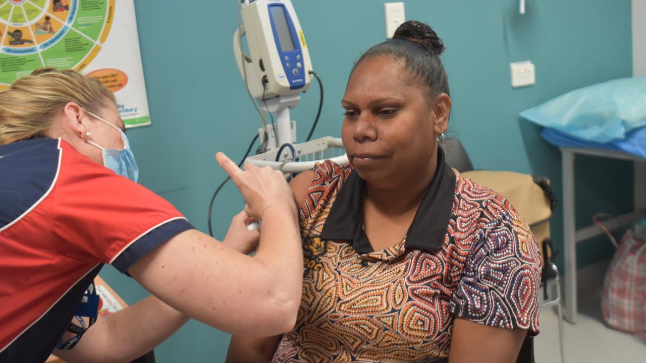 Sunrise Health's Michelle Farrell is given her first dose of the Pfizer Covid-19 vaccine. Picture: Thomas Morgan