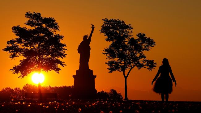 Tasmania's Liza-Jane Sowden photographed at sunrise at Liberty State Park in New Jersey in a Pony Black tutu. Picture: Gary Hershorn