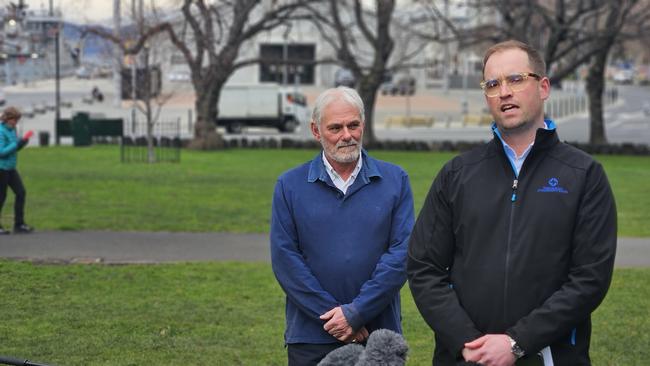 Tasmanian Community Fund board members Ric De Santi and Alex McKenzie speak to the media on parliament Lawns on Thursday August 8, 2024. Photo: David Killick