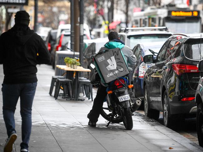 Perhaps food-delivery scooters choking a section of footpath is the price you have to pay for takeaway. Picture: Penny Stephens