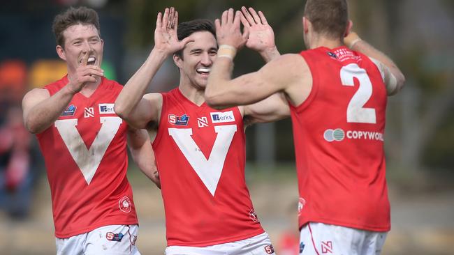 Tom Schwarz celebrates a goal for North Adelaide. Picture: Dean Martin