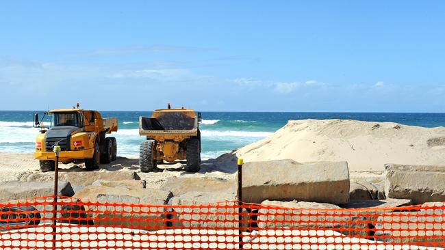 Work on the beach at Narrow Neck. Picture: John Gass