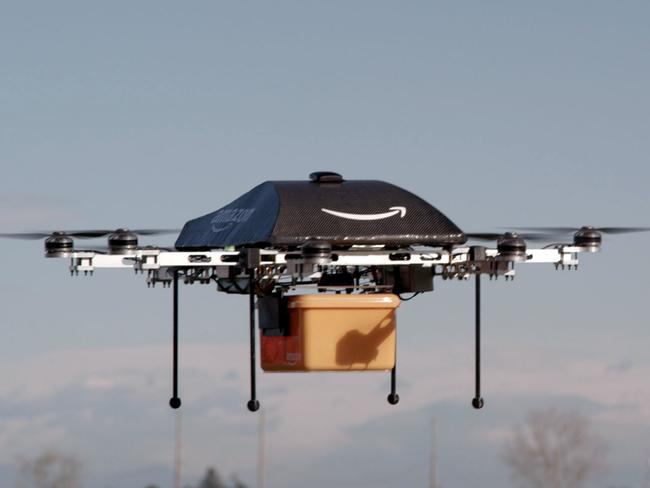 (FILES) This file photo taken on December 1, 2013 shows This undated handout photo released by Amazon shows a flying 