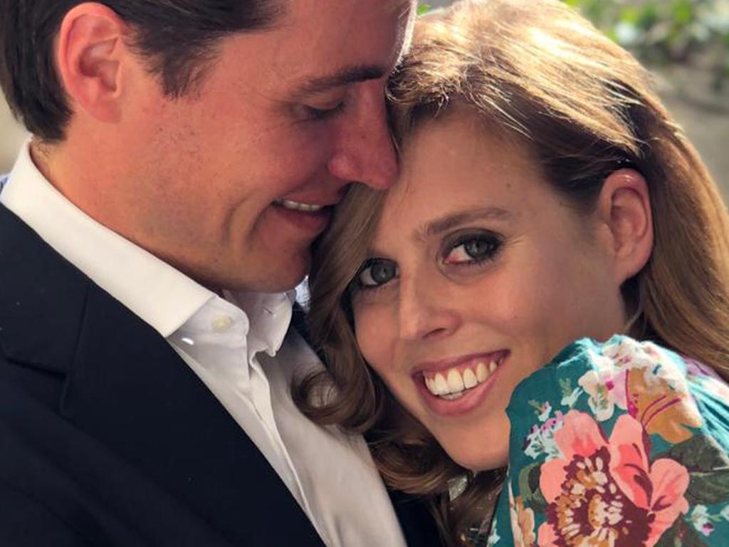 TOPSHOT - In an undated recent handout picture released by Buckingham Palace and taken by Britain's Princess Eugenie of York, Britain's Princess Beatrice of York (R) poses with her finacee Edoardo Mapelli Mozzi (L) in Italy. - Queen Elizabeth II's granddaughter Princess Beatrice is engaged to marry property developer Edoardo Mapelli Mozzi, Buckingham Palace said in a statement on Thursday. The couple "became engaged while away for the weekend in Italy earlier this month," the palace said in a statement, adding that the wedding will take place in 2020. (Photo by Princess EUGENIE / BUCKINGHAM PALACE / AFP) / RESTRICTED TO EDITORIAL USE - MANDATORY CREDIT "AFP PHOTO / BUCKINGHAM PALACE / PRINCESS EUGENIE" - NO MARKETING NO ADVERTISING CAMPAIGNS - RESTRICTED TO SUBSCRIPTION USE - NO SALES - NO USE AFTER OCTOBER 26, 2019 - PHOTOGRAPH MUST NOT BE ENHANCED, MANIPULATED OR MODIFIED - PHOTOGRAPH TO BE USED SOLELY FOR PURPOSES OF COMTEMPORANEOUS NEWS REPORTING, ILLUSTRATION OF EVENTS, THINGS OR PEOPLE IN THE IMAGE OR FACTS MENTIONED IN THE CAPTION - DISTRIBUTED AS A SERVICE TO CLIENTS /