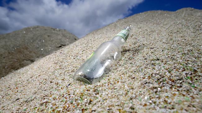 A 30 tonne pile of glass made from 176,470 recycled bottles used as a substitute to sand. Picture: Marc McCormack