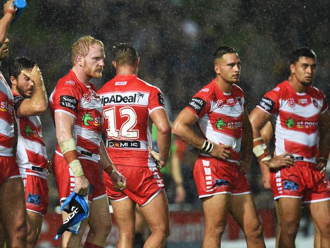 Dejected Dragons players. Picture: Zak Simmonds