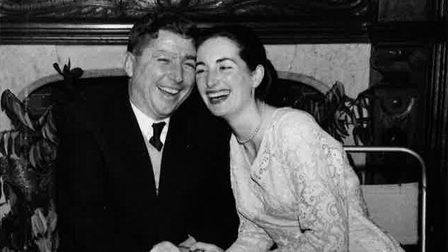 Norington, in his wheelchair, with wife Jacqueline on December 14, 1955.