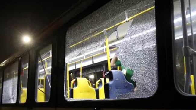 The media bus was left with multiple shattered windows from suspected stray bullets