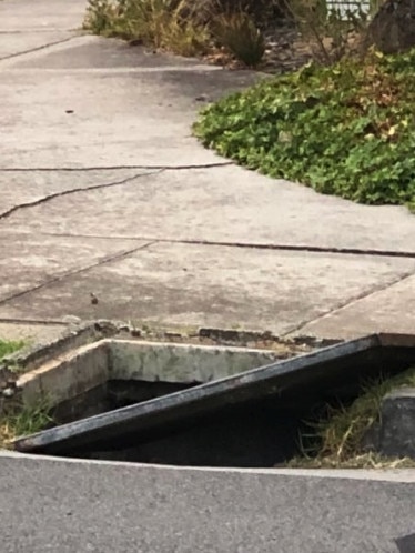 An open manhole cover in Kingston. Picture: Snap Send Solve