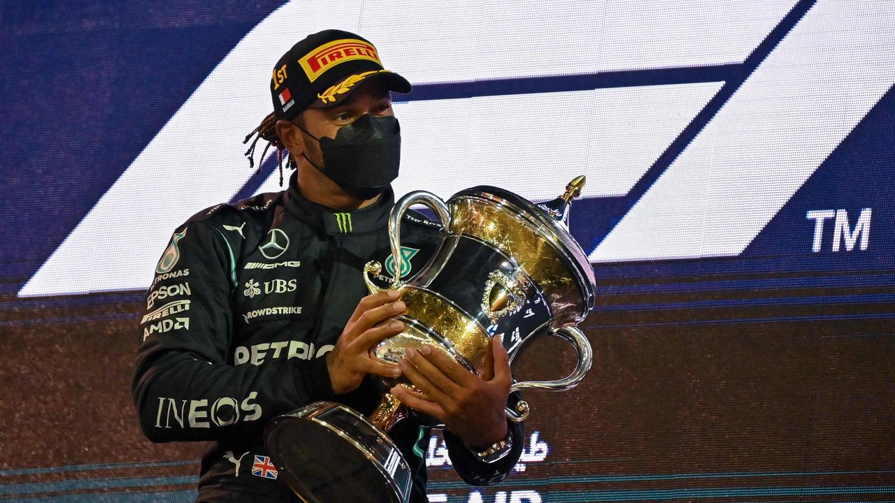 Lewis Hamilton claimed the first F1 race of the season - and it was an absolute epic. (Photo by ANDREJ ISAKOVIC / AFP)