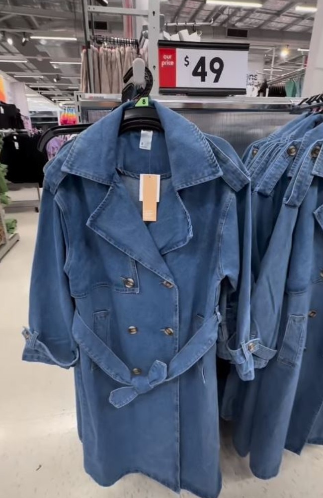 Kmart is selling a denim trench for $49 – but the affordable garment has divided shoppers. Instagram/jenlourdes