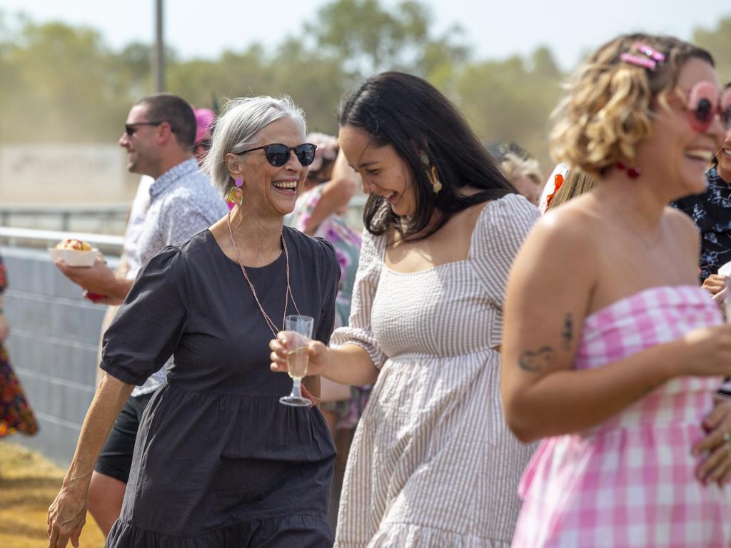 Punters at the Ladies Day 2022 races laughing after friends won big on a race. Picture: Floss Adams.