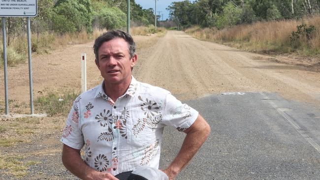 Livingstone Shire councillor Adam Belot stands on Ritamada Road at Emu Park on November 22, 2022.