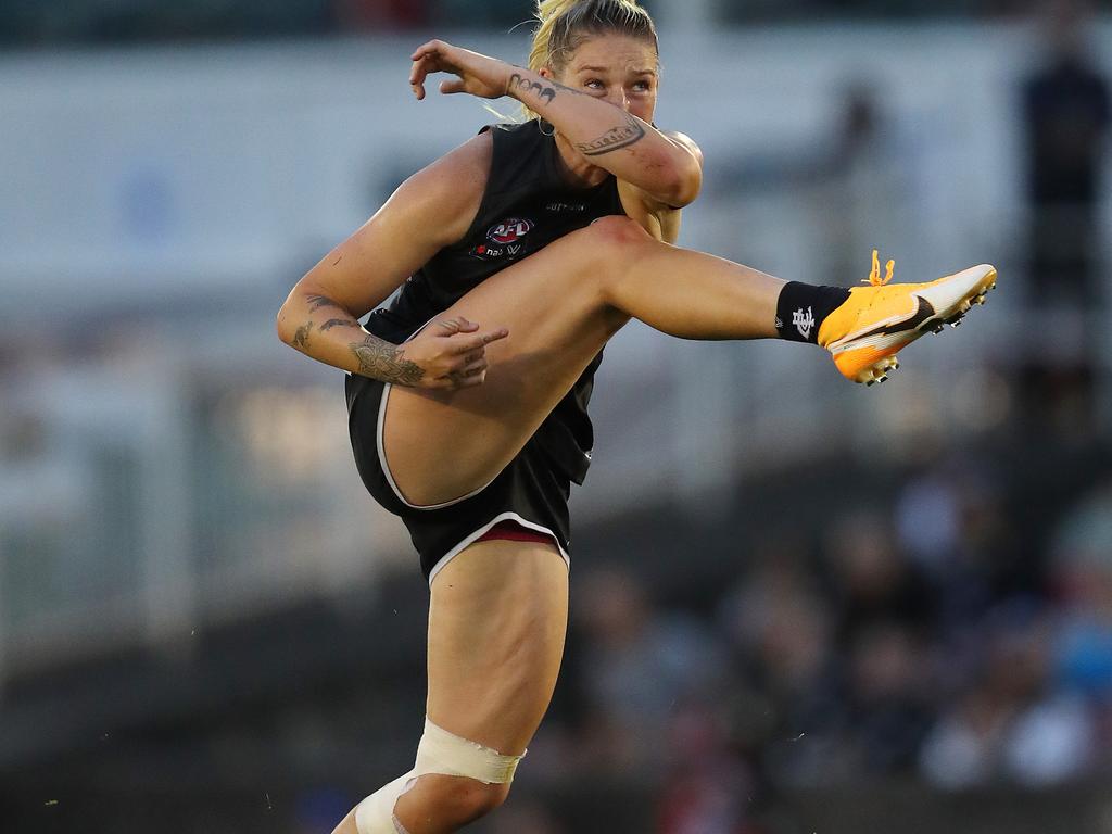 Carltons Tayla Harris kicks long at goal during the 3rd qtr. . Pic: Michael Klein