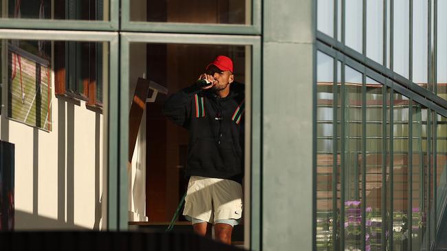 Kyrgios celebrates the best two weeks of his grand slam career with a well-earned beer. Picture: Getty