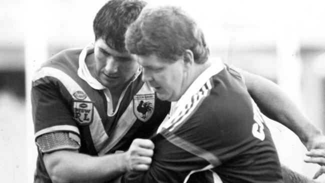 Eastern Suburbs front-rower Danny Shepherd is assisted from the field in 1990.