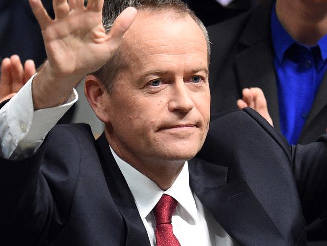 Australian Federal Opposition Leader Bill Shorten celebrates after delivering the 2016-17 Federal Budget Reply speech in the House of Representatives at Parliament House in Canberra, Thursday, May 5, 2016. (AAP Image/Sam Mooy) NO ARCHIVING