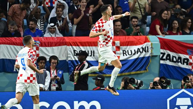 Croatia's midfielder Ivan Perisic (R) celebrates his equaliser. Picture: AFP