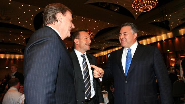 Joke’s on you ... Peter Costello, left, with Tony Abbott and Joe Hockey at a past Liberal Party dinner.