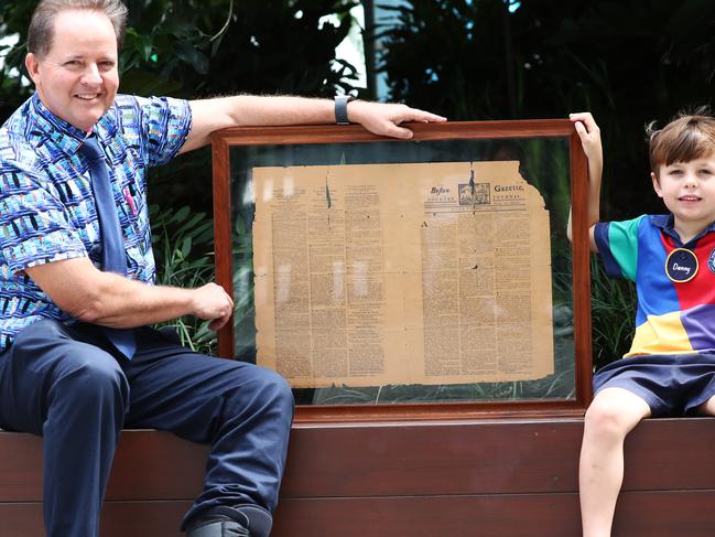 Teacher  Tom Betts with a 250 year old Boston Gazette and student Danny Hartley who coincidentally turns 250 weeks this week at Somerset College.Photograph : Jason O'Brien