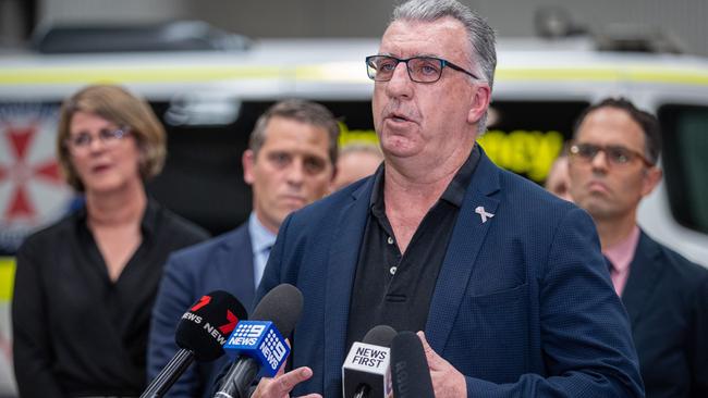 Gerard Hayes addresses the media about the wage deal with NSW Health Secretary Susan Pearce (l to r), Health Minister Ryan Park and Treasurer Daniel Mookhey. Picture: Christian Gilles