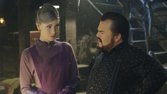 This image released by Universal Pictures shows Cate Blanchett, left, and Jack Black in a scene from "The House With A Clock in Its Walls."  (Quantrell D. Colbert/Universal Pictures via AP)