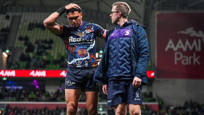 Xavier Coates hobbles from the field. Picture: NRL Photos