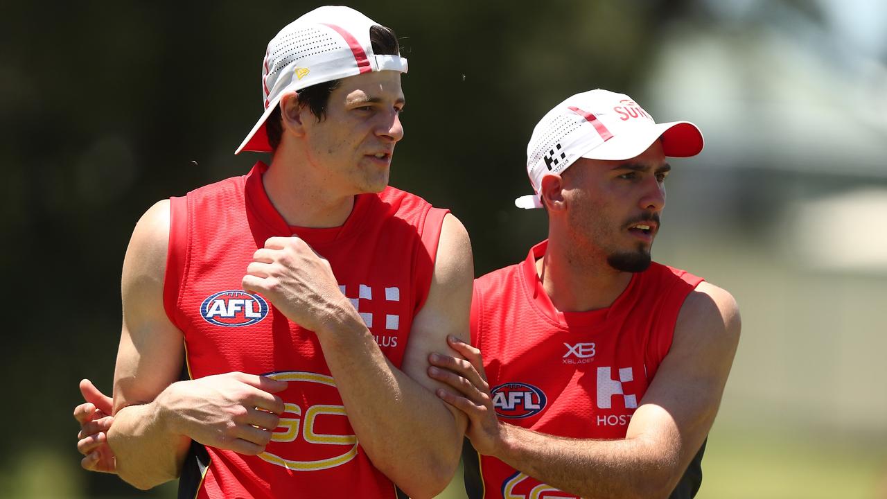 Chris Burgess and Izak Rankine during a training session in November.